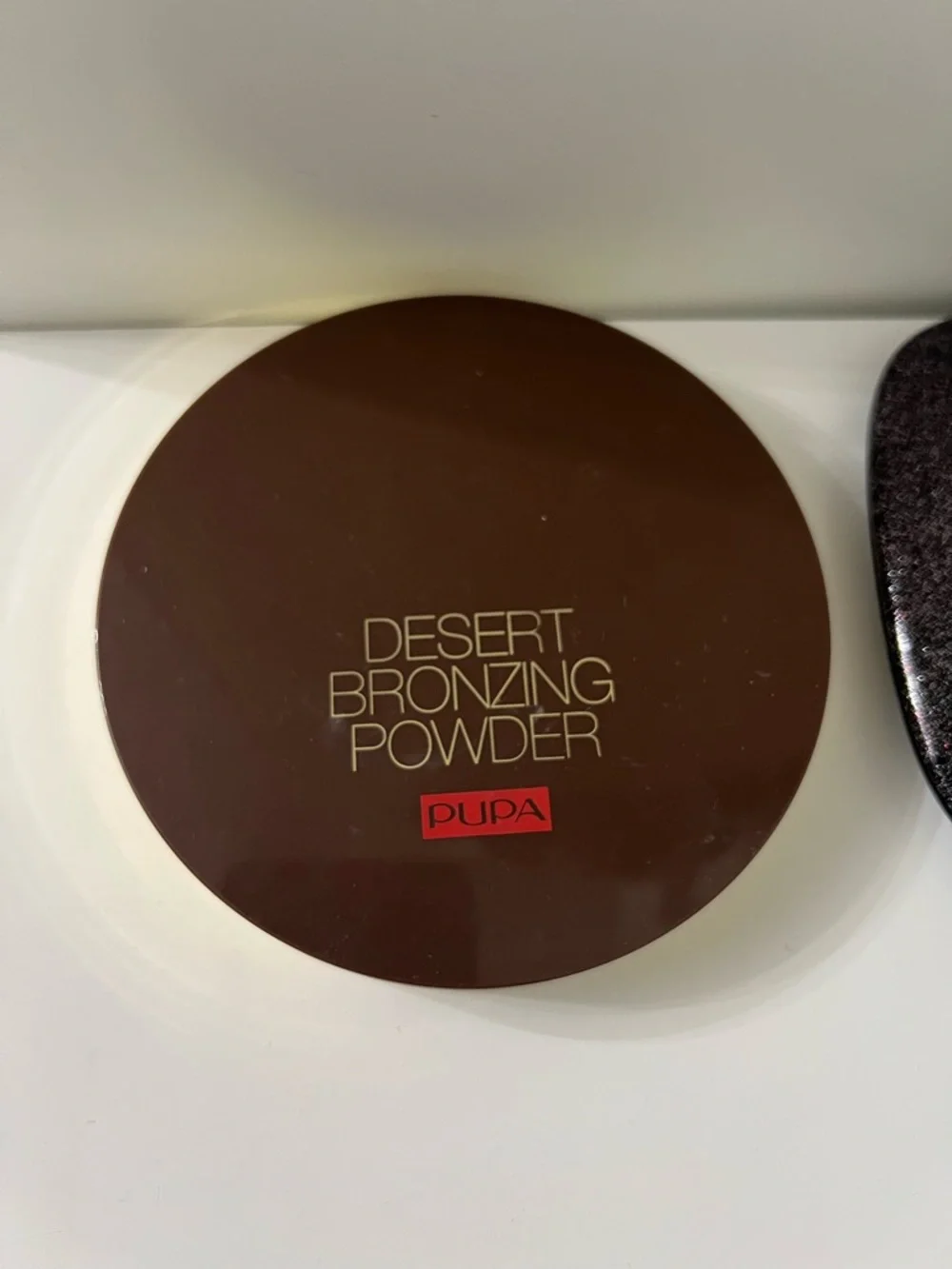 Marc Jacobs Highlighter, Puppa bronzer